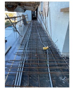 In-progress steel installation for the 5th floor walkway slab