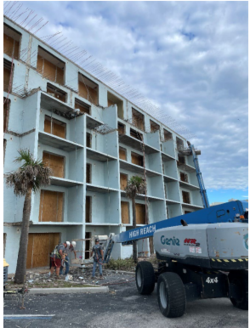 In-progress concrete demo on the balcony side of the building