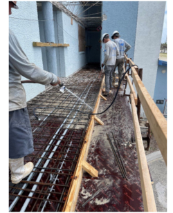 In-progress of cleaning out the forms on the South end of the walkway