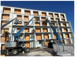 In-progress demolition on the balcony side of the building